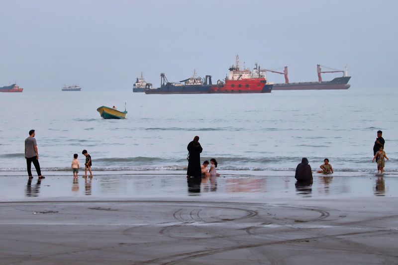 Trump's economic pressure on Iran contrasts with Tehran's ongoing influence over the Strait of Hormuz as shipping traffic remains severely restricted.