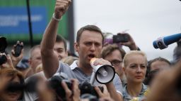 Russian opposition leader Alexei Navalny, center, addresses supporters and journalists after arriving from Kirov at a railway station in Moscow, Russia, Saturday, July 20, 2013. Navalny returned to Moscow on Saturday after his surprise release from jail and vowed he will push forward in his campaign to become mayor of the Russian capital. Navalny was sentenced to five years in prison on an embezzlement conviction on Thursday in the city of Kirov, but prosecutors unexpectedly asked for his release the next morning. (AP Photo/ Dmitry Lovetsky)