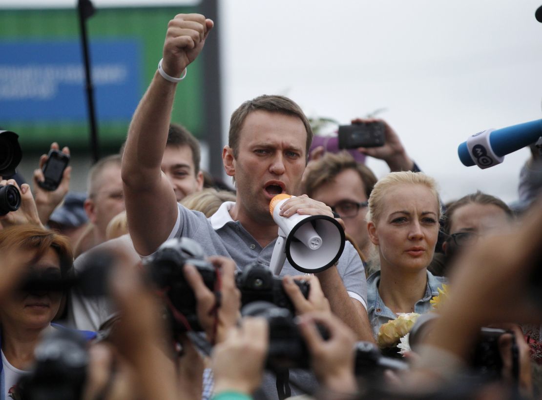 Alexei Navalny, center, addresses supporters and journalists in Moscow in 2013.