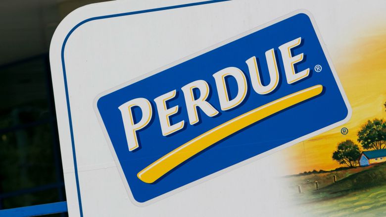 The Perdue logo is seen on a sign outside a chicken processing facility in 2015.