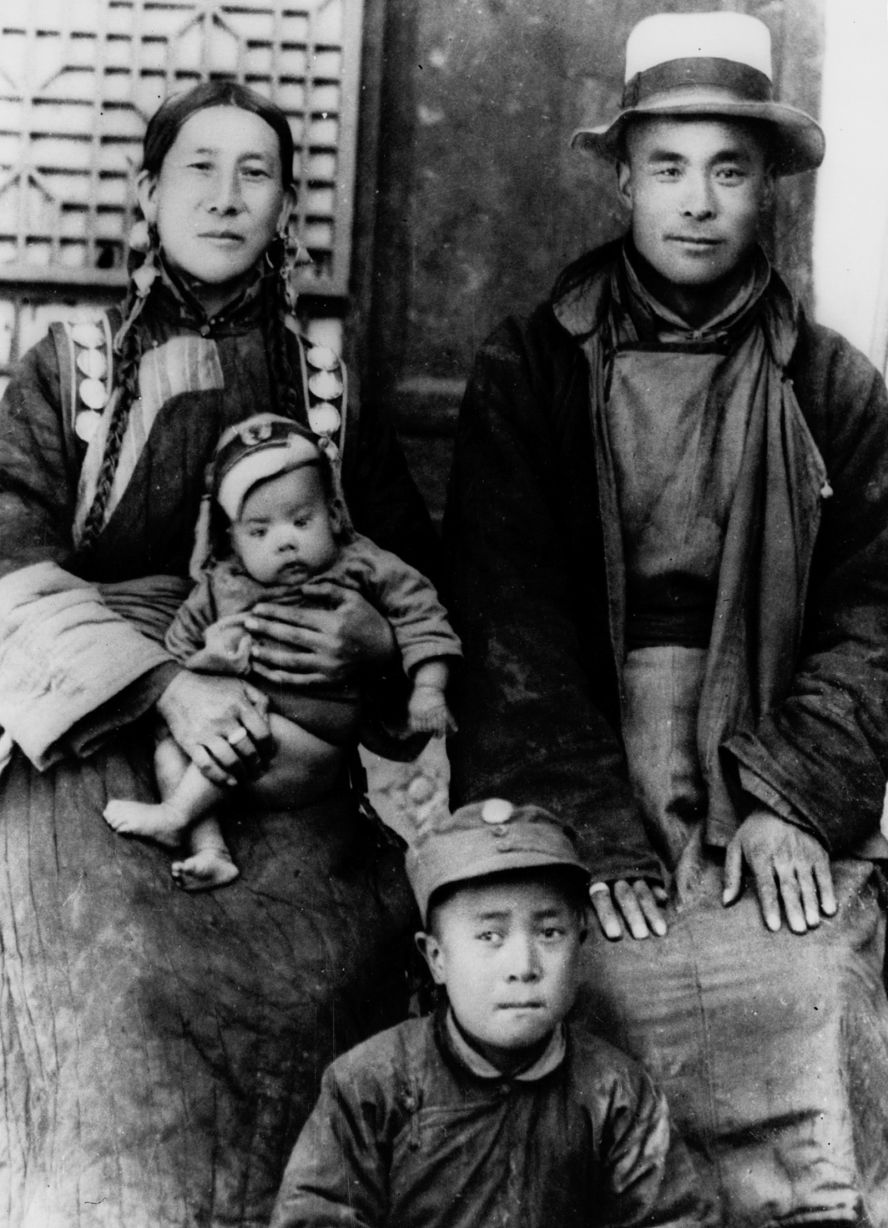His parents were peasant farmers, pictured here with two of their other sons. In 1938, the future Dalai Lama was taken to the Kumbum monastery after he was found by a delegation of monks and correctly identified several objects that belonged to the previous Dalai Lama.