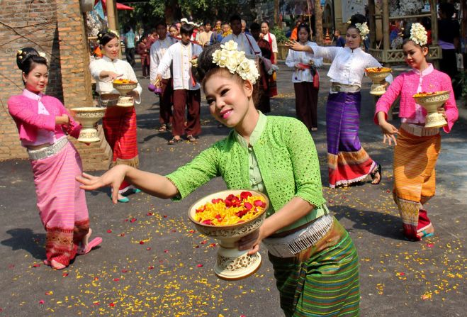<strong>Dancing in the street: </strong>Dancers perform during the opening ceremony of Songkran festival celebrations in Chiang Mai. The Thai New Year officially starts on April 13.