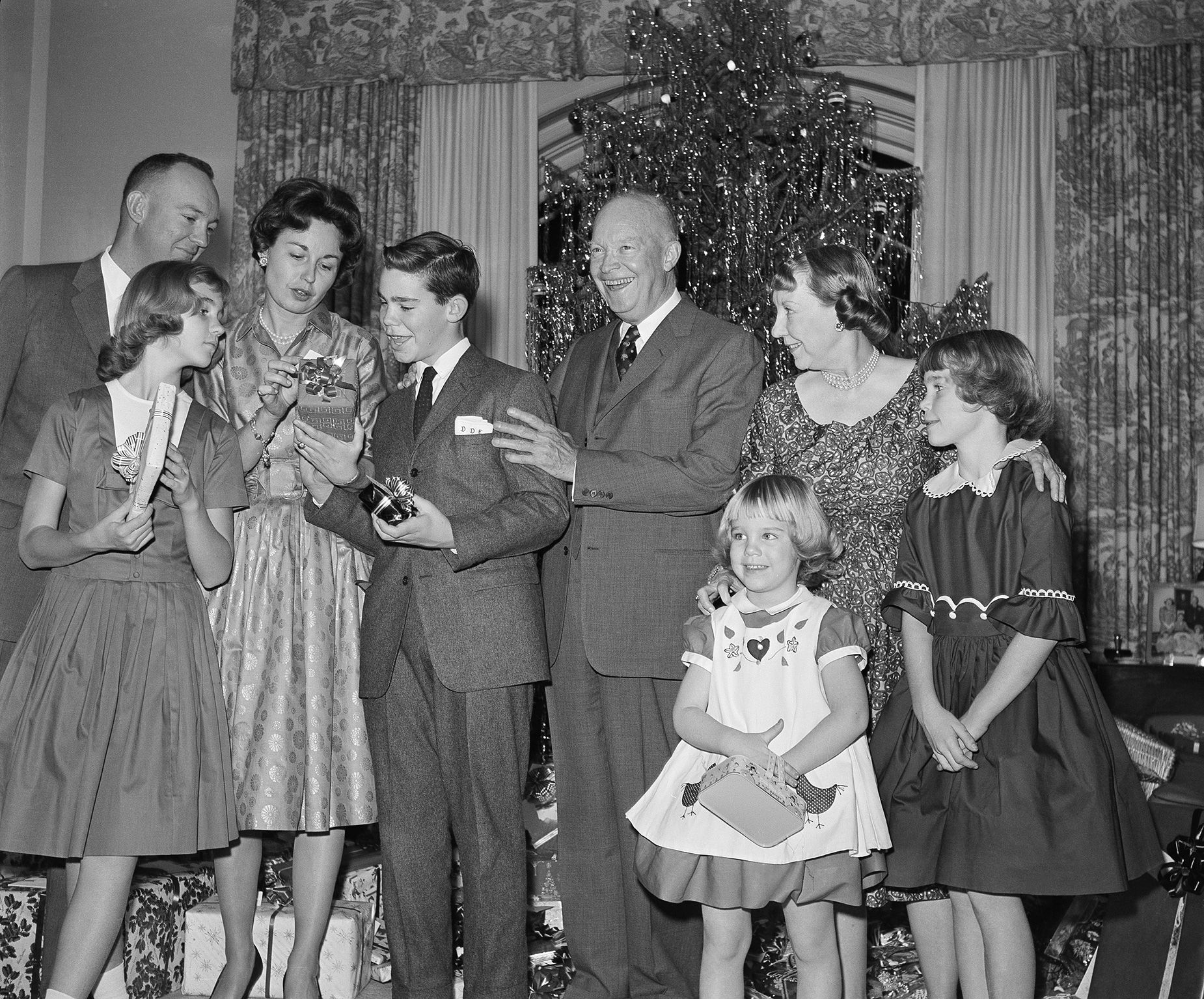 <strong>1960:</strong> The Eisenhower family on Christmas Eve. Mamie Eisenhower (second from right) was the first first lady to expand holiday decorations at the White House.