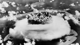 This handout photo from the US Air Force, shows the water column from the underwater atom bomb blast in the lagoon of the Bikini Atoll Islands rise through the disintegrating vapor cloud, on July 25, 1946.