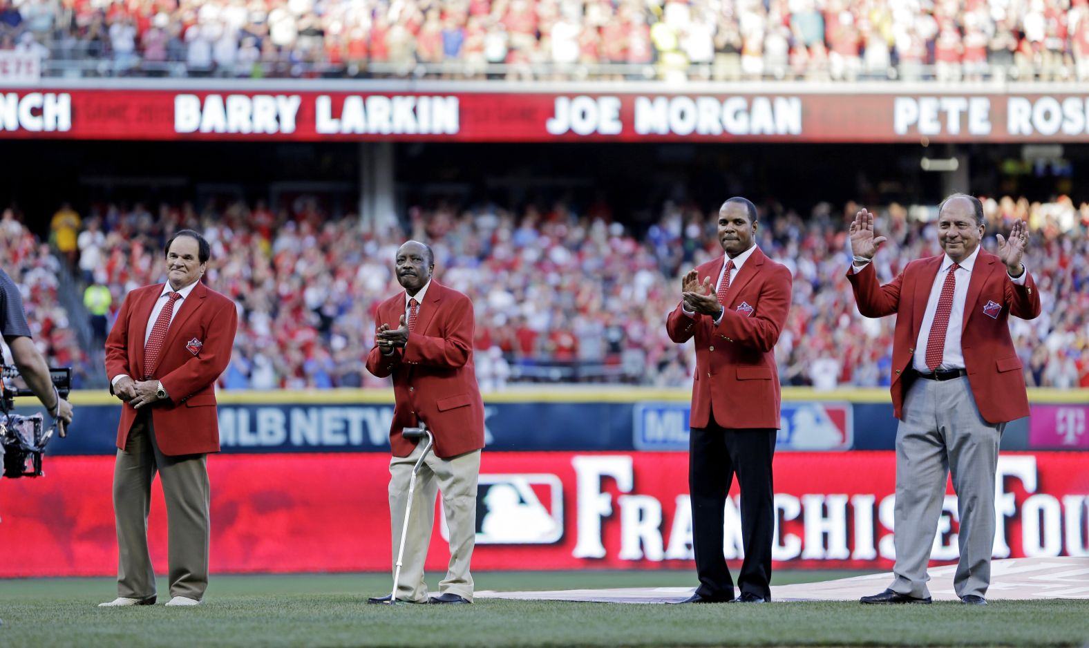 From left, Rose, Joe Morgan, Barry Larkin and Johnny Bench throw out ceremonial first pitches before the 2015 MLB All-Star Game.