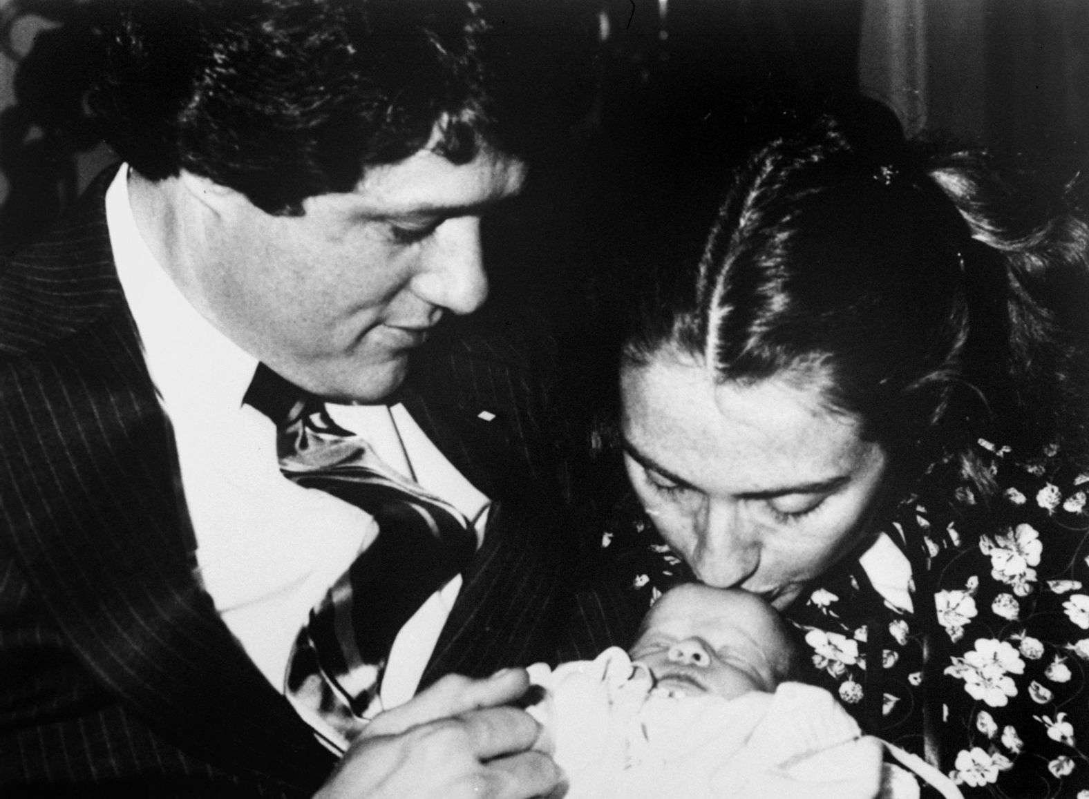 The Clintons with their week-old daughter Chelsea in March 1980.