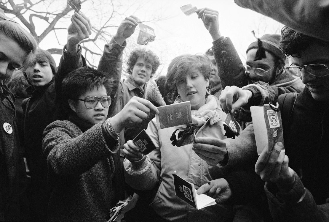 University of Pennsylvania students burn mock passbooks, like those carried by Black South Africans, at a rally to demand the university divest from South Africa's apartheid government on Feb. 10, 1986.