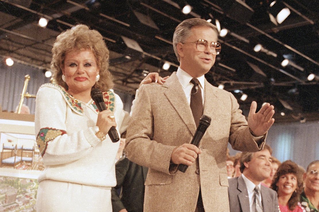 Jim Bakker and then-wife Tammy Faye, pictured in 1986, were revered by viewers for their TV-ready sermons.