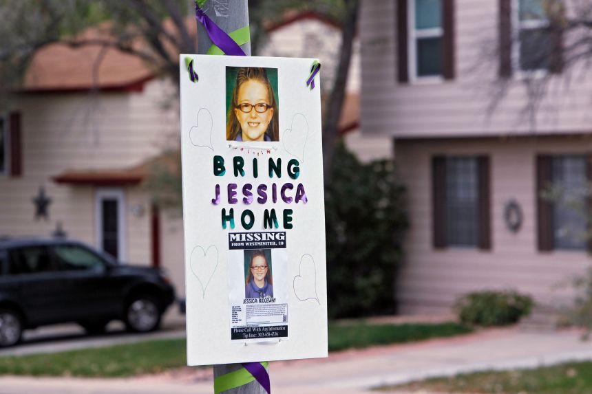 A missing person sign is posted on a lamp post near the home of Jessica Ridgeway on October 10, 2012.