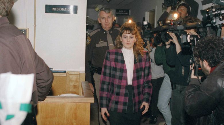 Pamela Smart comes into court at the Rockingham Superior Court House in Exeter, New Hampshire on Friday, March 22, 1991, where she was found guilty on all three charges related to her involvement in the murder of her husband Gregory Smart. Smart was convicted and sentenced to life in prison with no chance of parole. (AP Photo/Lisa Bul)