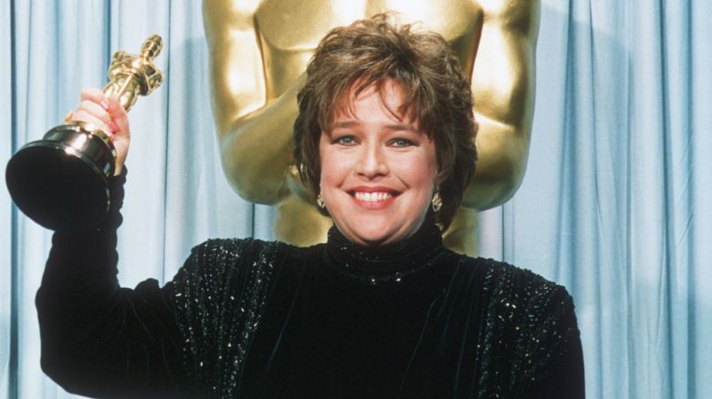 Kathy Bates holds her Oscar statuette backstage at the 63rd annual Academy Awards in 1991. Bates won best actress for her performance in "Misery."