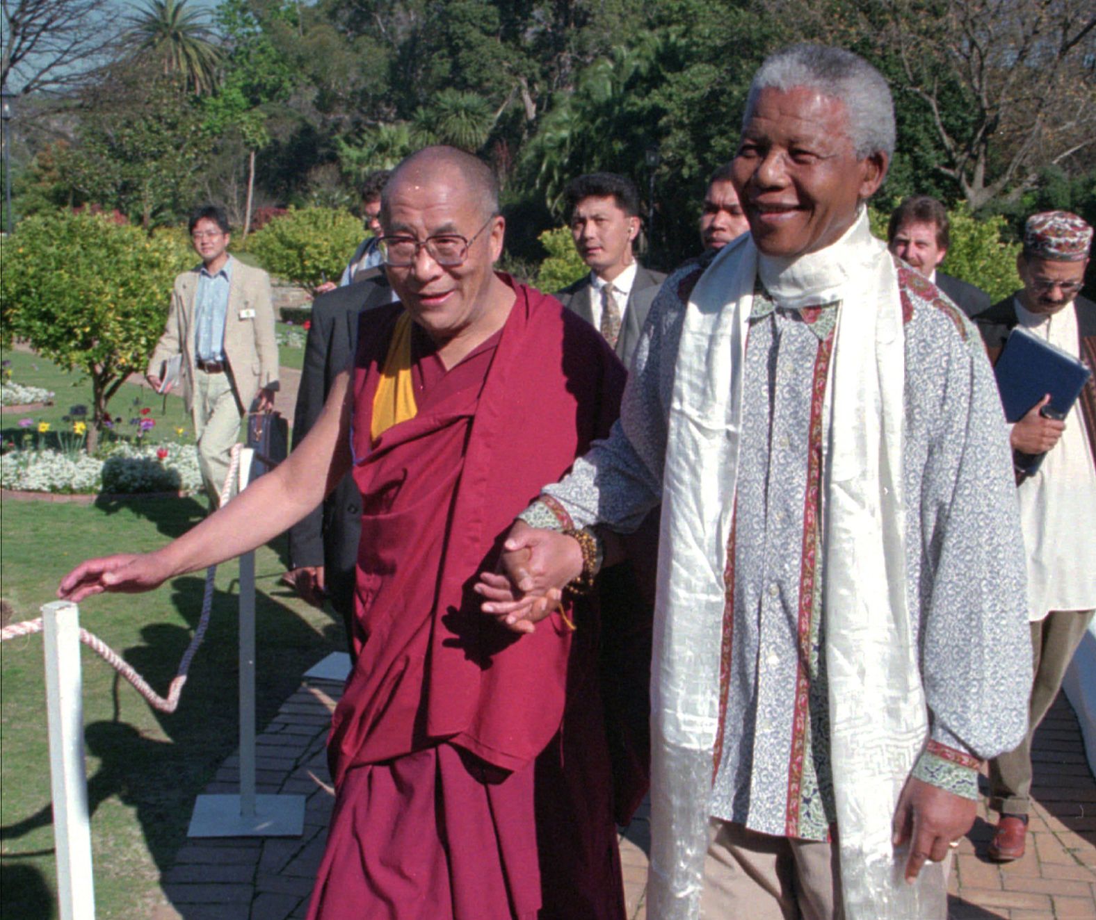 In 1996, the Dalai Lama meets with <a href="index.php?page=&url=https%3A%2F%2Fwww.cnn.com%2F2013%2F03%2F28%2Fafrica%2Fgallery%2Fnelson-mandela%2Findex.html">Nelson Mandela</a>, the prisoner-turned president who reconciled South Africa after the end of apartheid.