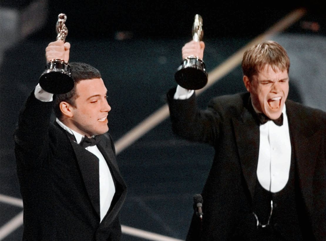 Ben Affleck and Matt Damon, right, react to winning the Oscar for best original screenplay for "Good Will Hunting" at the 70th Academy Awards in 1998.