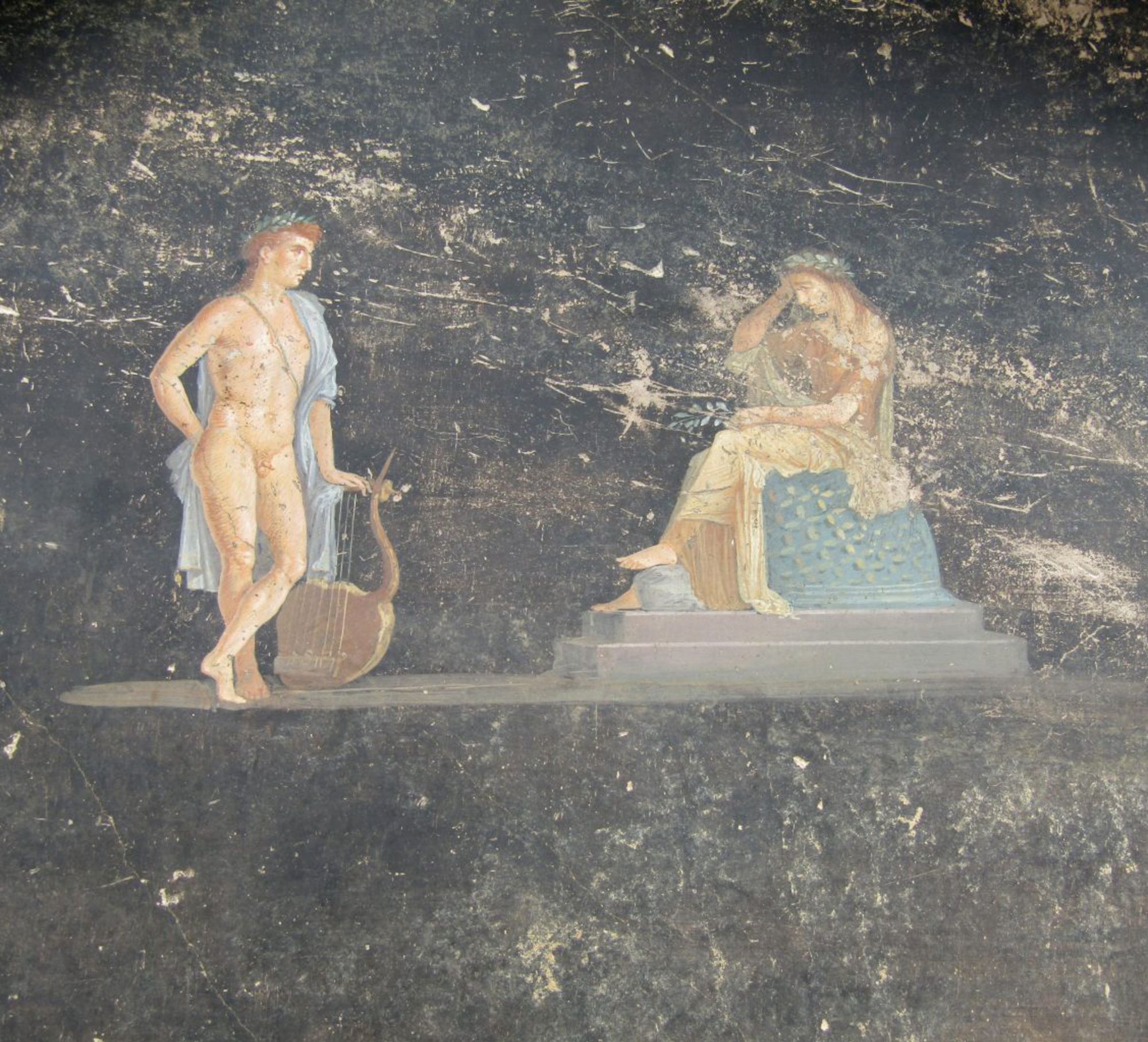 A fresco depicts the mythological character of ancient Greek god Apollo with a downcast Cassandra, daughter of King Priam of Troy.