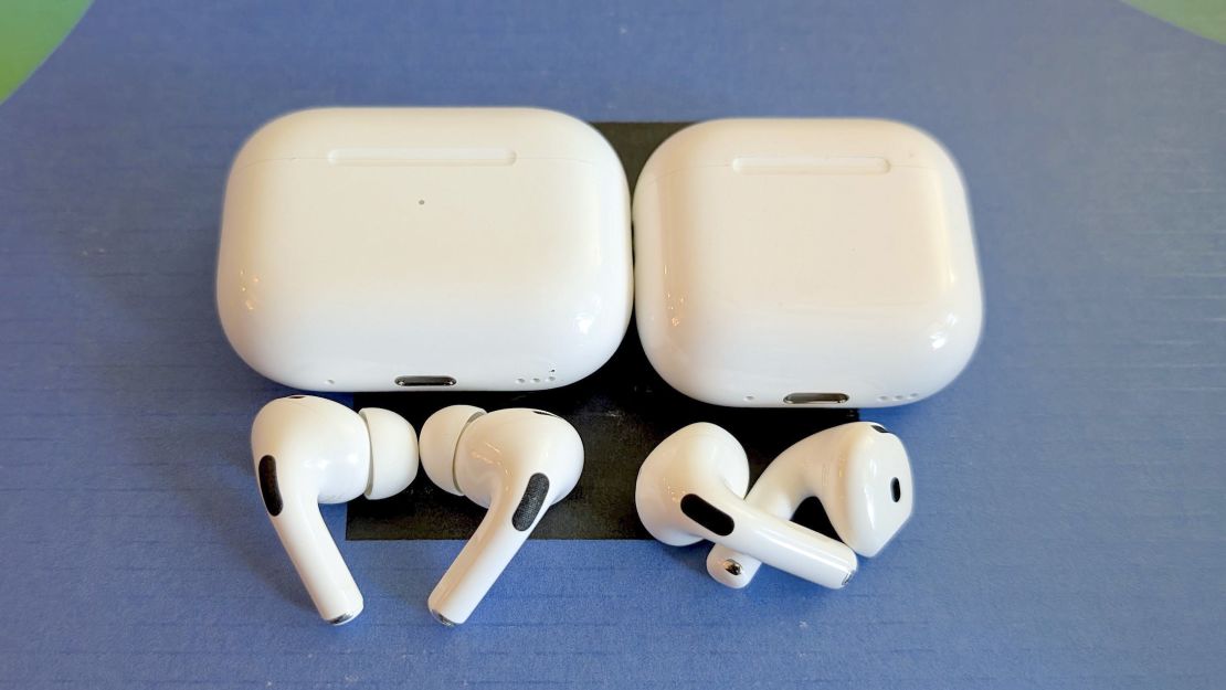 Airpods 4 and Airpods Pro 2 next to their cases.