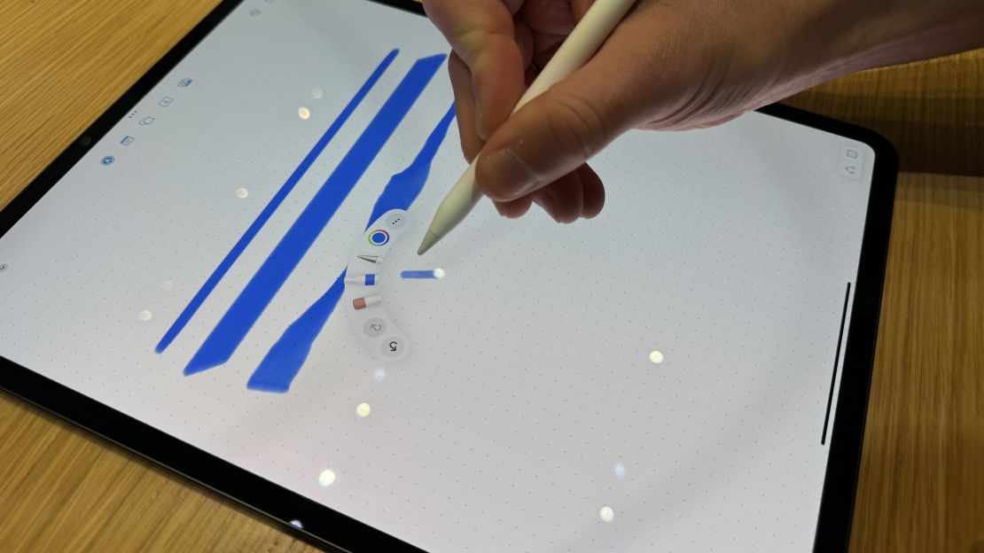 An Apple Pencil Pro's squeeze menu appears while using it on an iPad Pro M4