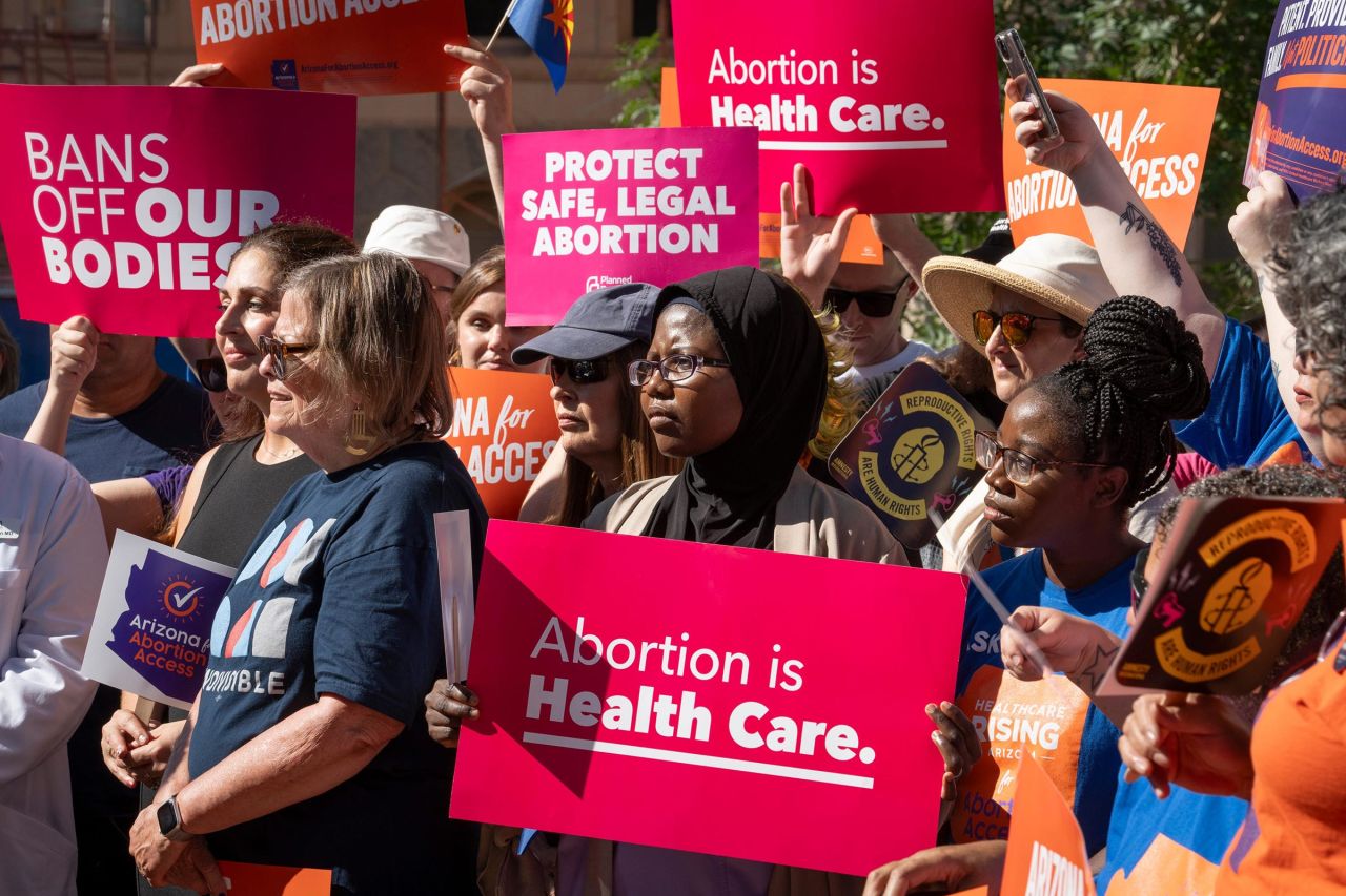 Supporters listen during an Arizona for Abortion Access news conference on July 3, 2024, at the Arizona State Capitol.