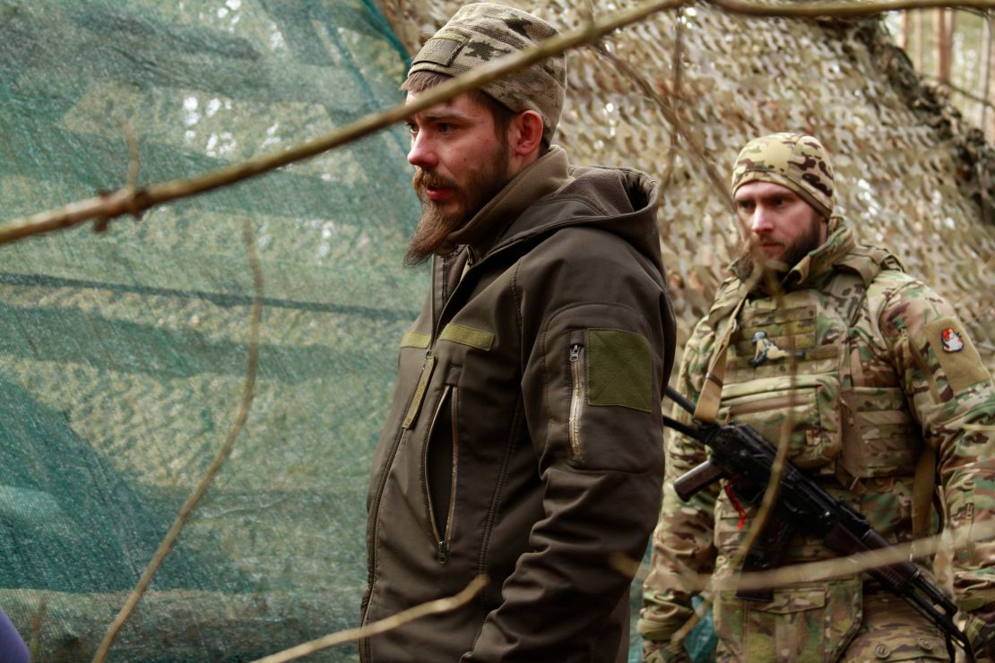 Gunner Artem (left) and his troop commander Oleh Bulatetskyi are pictured in eastern Ukraine.