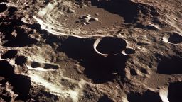 An oblique of the Crater Daedalus on the lunar farside as seen from the Apollo 11 spacecraft in lunar orbit. The view looks southwest. Daedalus (formerly referred to as I.A.U. Crater No. 308) is located at 179 degrees east longitude and 5.5 degrees south latitude. Daedalus has a diameter of about 50 statute miles.