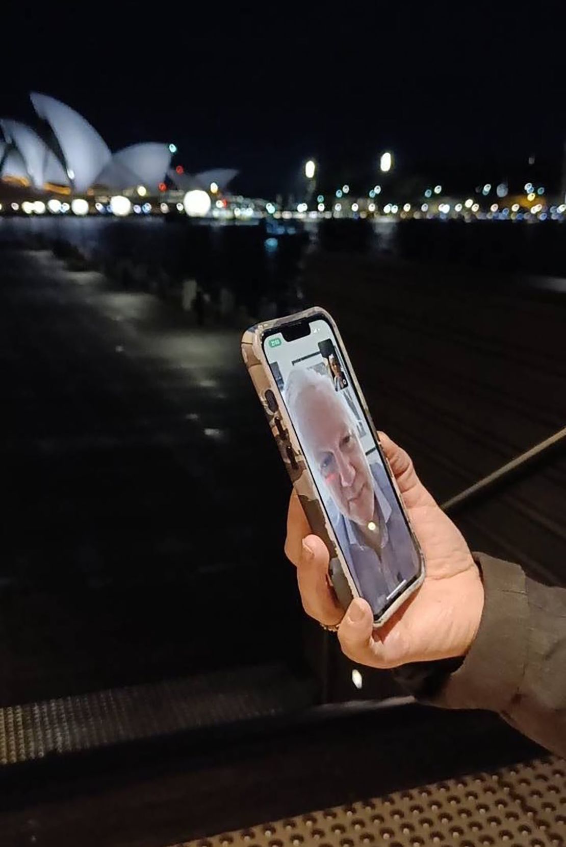 Stella Assange, the wife of Julian Assange, shared a photo of Julian appearing on a phone screen in Sydney, Australia, as he made a video call from Stansted Airport in London.