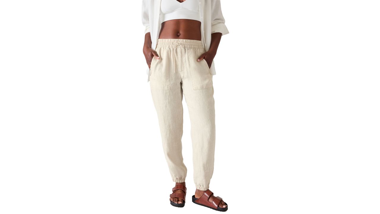 Woman wearing undyed athleta retreat linen joggers