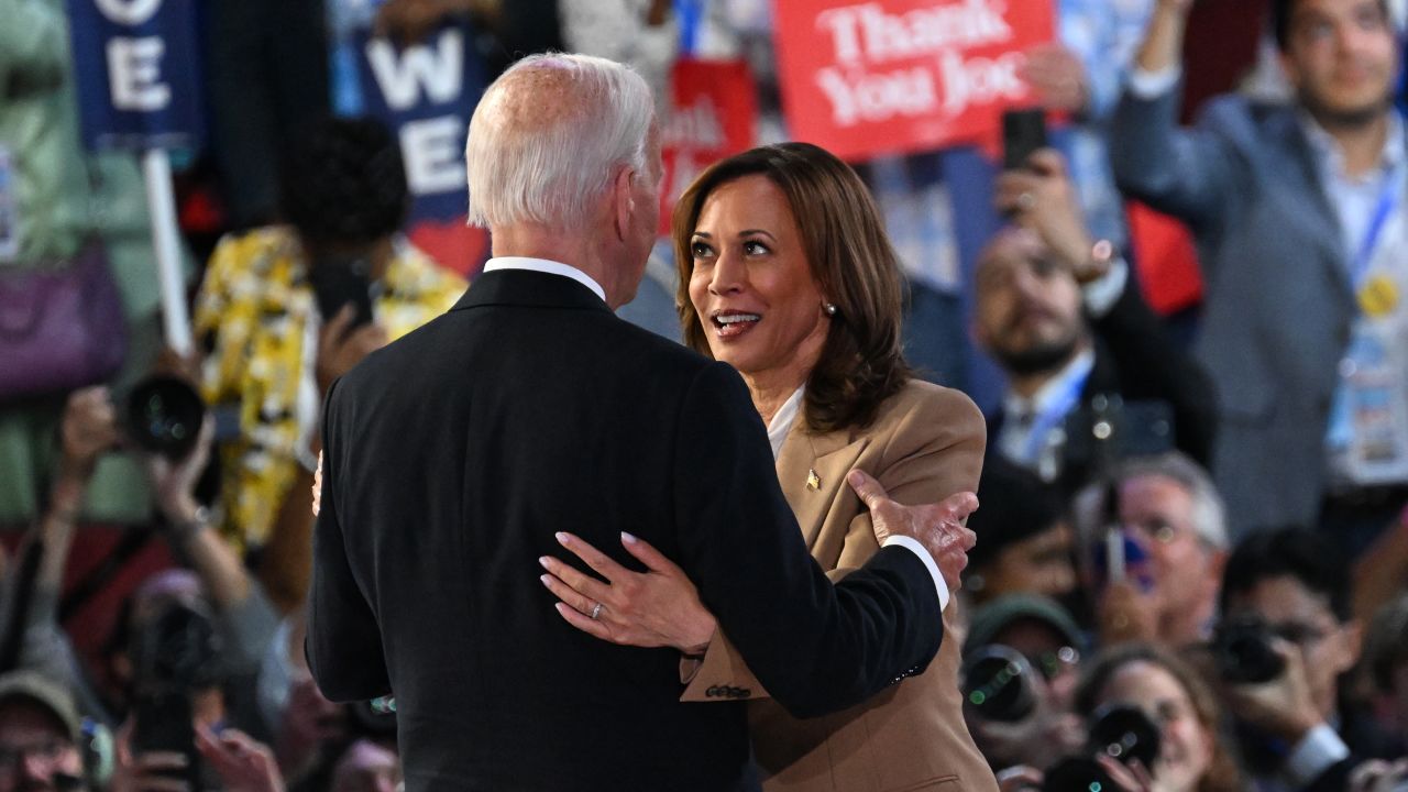 Biden and Harris embrace at the 2024 Democratic National Convention in Chicago on August 19, 2024. (Austin Steele/CNN)