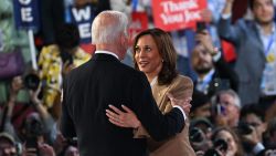 Biden and Harris embrace at the 2024 Democratic National Convention in Chicago on August 19, 2024. (Austin Steele/CNN)