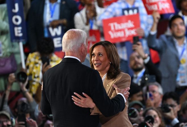 President Joe Biden and Harris embrace after his keynote address on Monday. “I love you,” <a href=