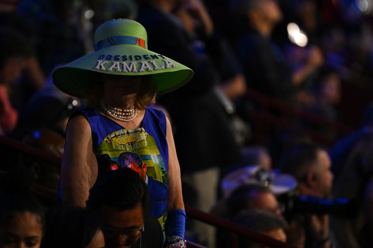 A convention attendee wears a hat that says "President Kamala" on Wednesday.