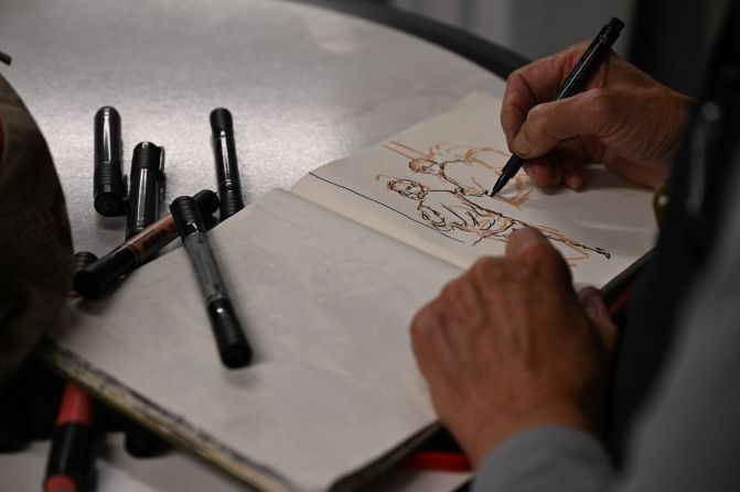 Sketch artist Donald Owen Colley draws for the Chicago Reader newspaper on Wednesday.