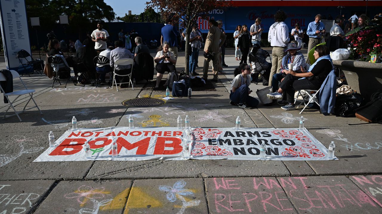 A banner calling for an arms embargo against Israel is laid outside the 2024 Democratic National Convention in Chicago on August 22, 2024.