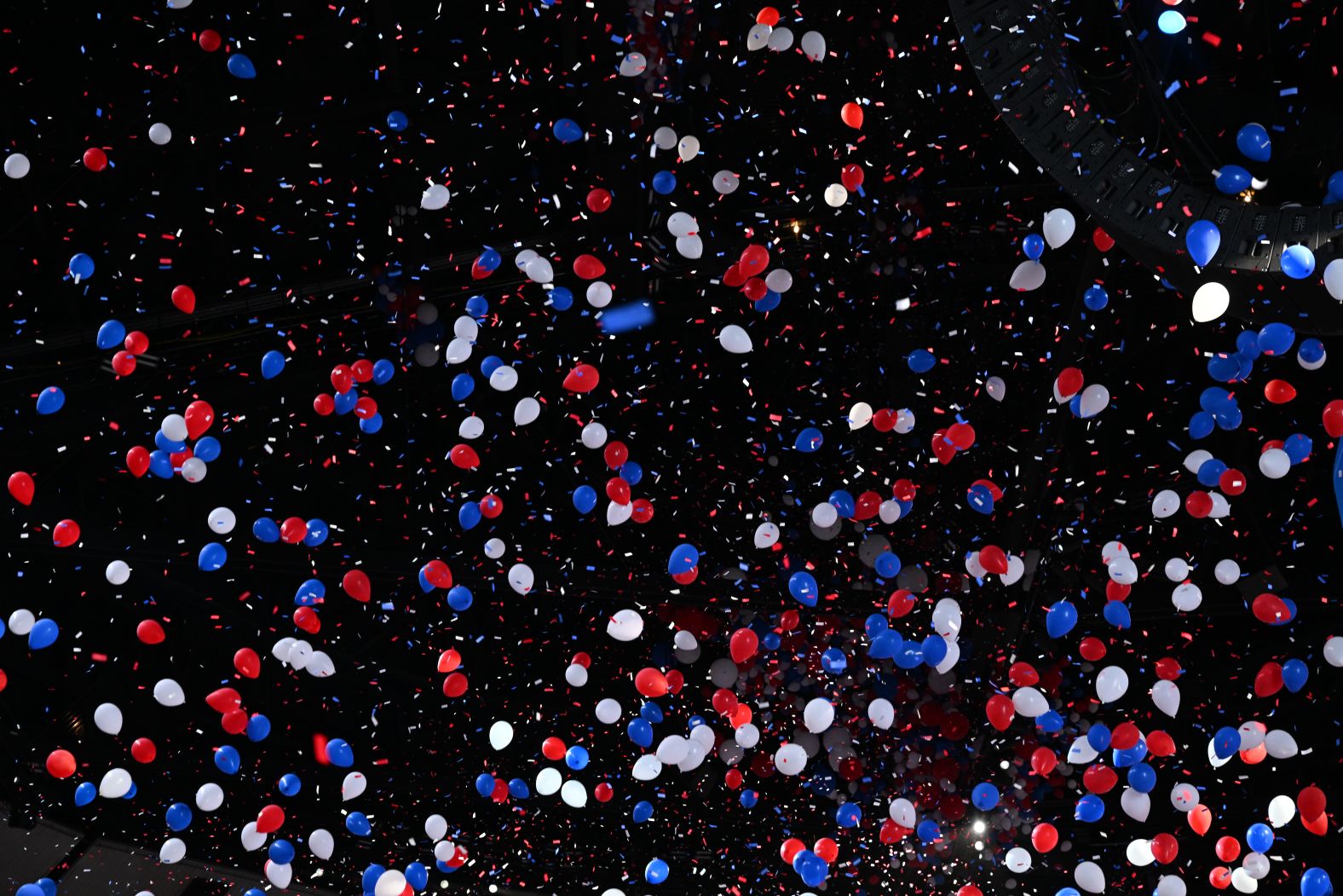 There were <a >100,000 red, white, and blue balloons</a> that fell from the United Center ceiling.