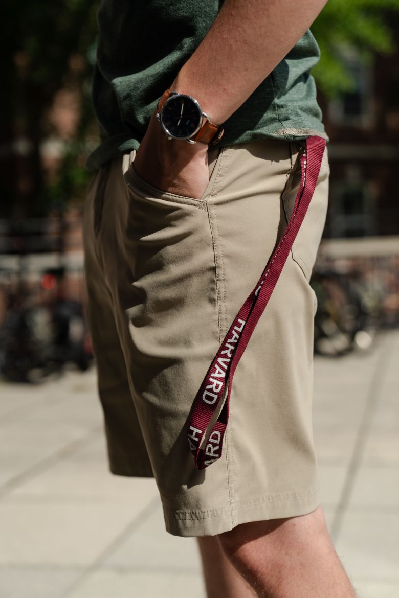 A Harvard lanyard hangs from Gillum's pocket.