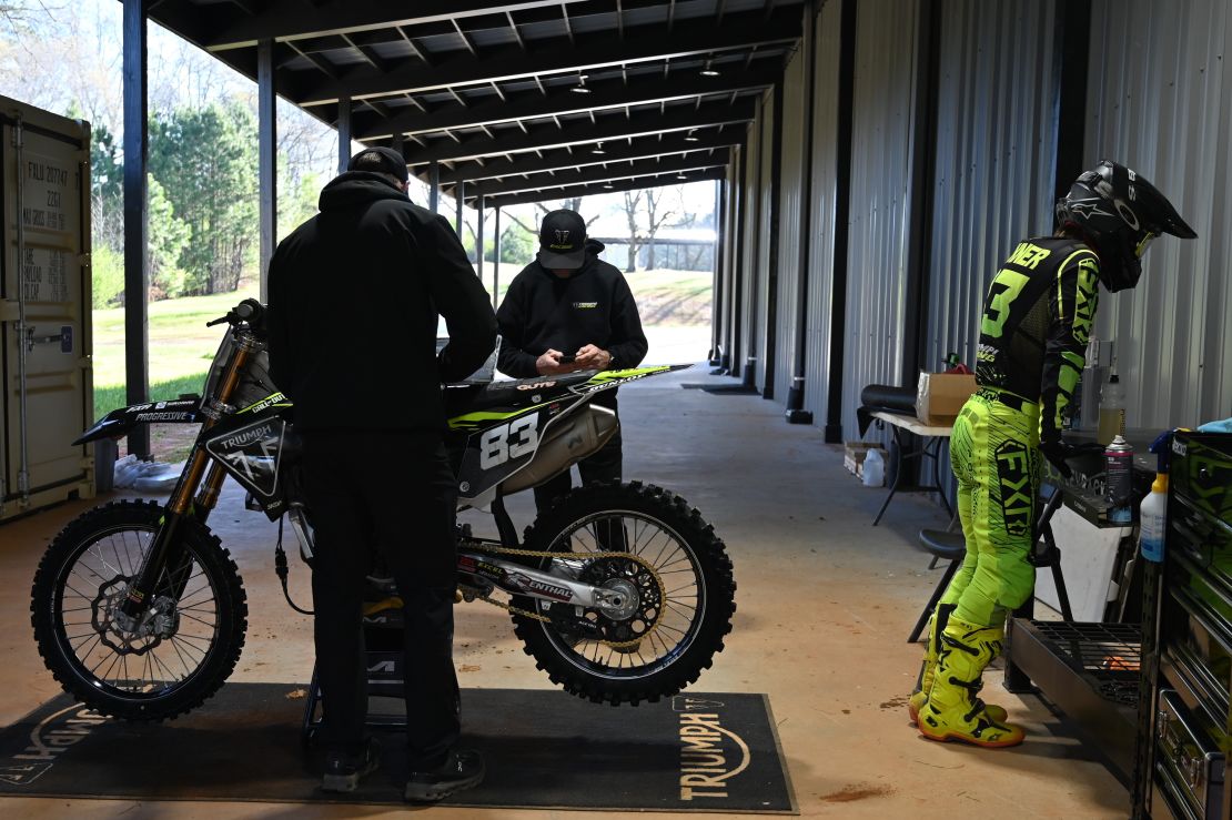Forkner's team readies his Triumph TF 250-X for a race simulation training session.
