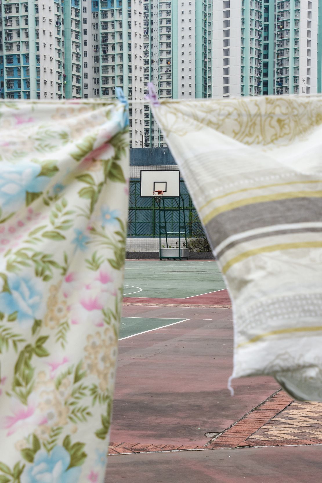 Bell observed non-sporting activities on the courts, like laundry drying at this venue in Tin Shui Wai.