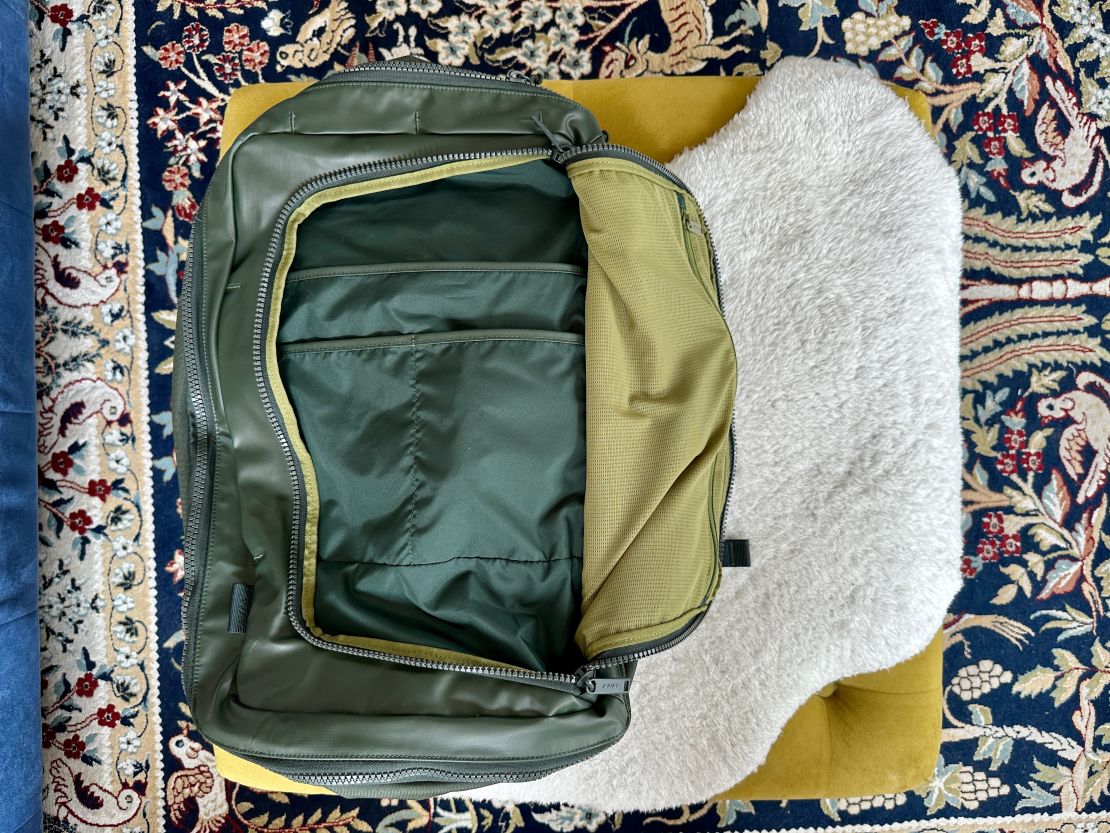 A photo of the Away FAR 45L backpack's front pocket