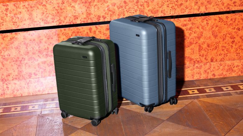 Away's gloss suitcases now come in Orchid and Navy colors
