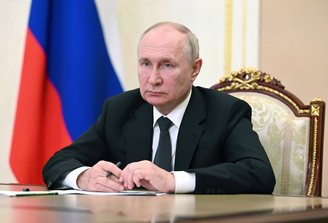 Russian President Vladimir Putin chairs a meeting with members of the government via a video conference at the Kremlin in Moscow, Russia,  on August 2.