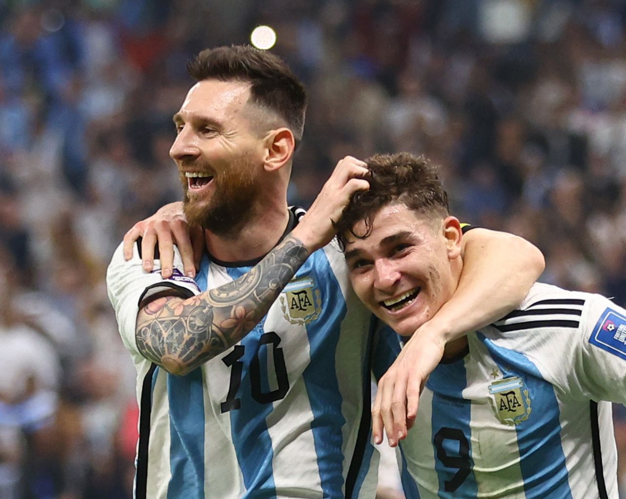 Argentina's Lionel Messi, left, and Julián Álvarez celebrate Álvarez's goal at Lusail Stadium in Lusail City, Qatar on Tuesday.