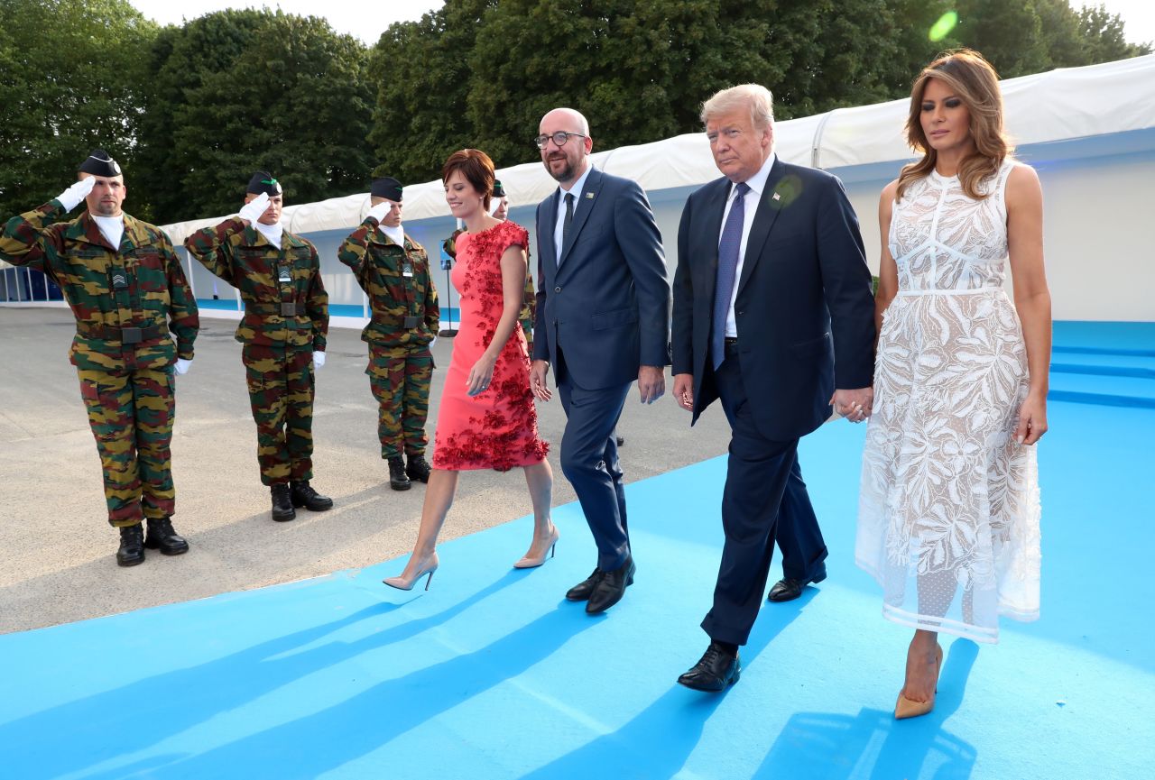 (Left to right) Belgian Prime Minister's partner Amelie Derbaudrenghien, Belgian Prime Minister Charles Michel, President Trump and Melania Trump arrive for the NATO dinner 