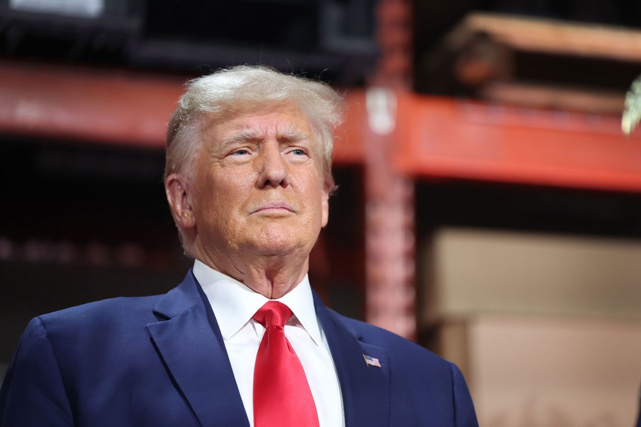 Former President Donald Trump speaks to guests during a campaign stop at Drake Enterprises, an automotive parts manufacturer, on September 27, 2023 in Clinton Township, Michigan. 