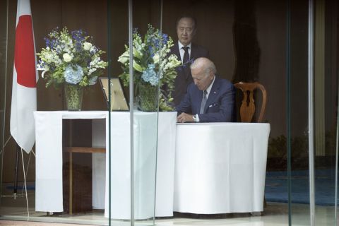 President Joe Biden signs a condolence book in honor of deceased former Japanese Prime Minister Shinzo Abe at the Japanese Ambassador’s residence in Washington, DC, on July 8. 