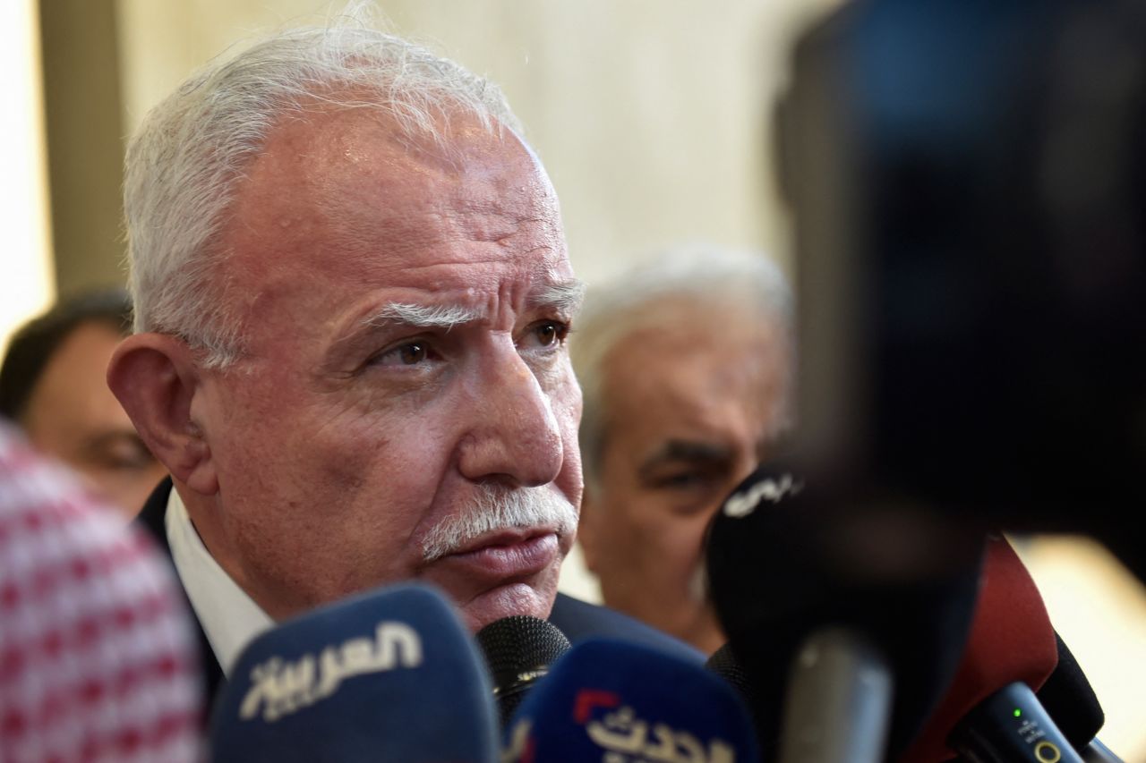 Riyad Al-Maliki talks to the press after a meeting in Jeddah, Saudi Arabia, on October 18.