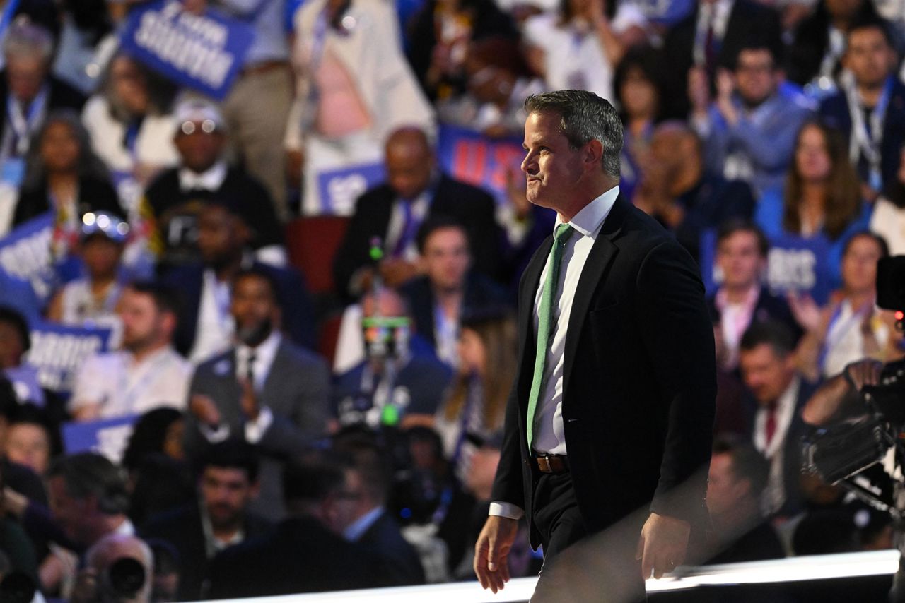 Former Republican Rep. Adam Kinzinger arrives on stage during the DNC on Thursday, August 22, in Chicago.