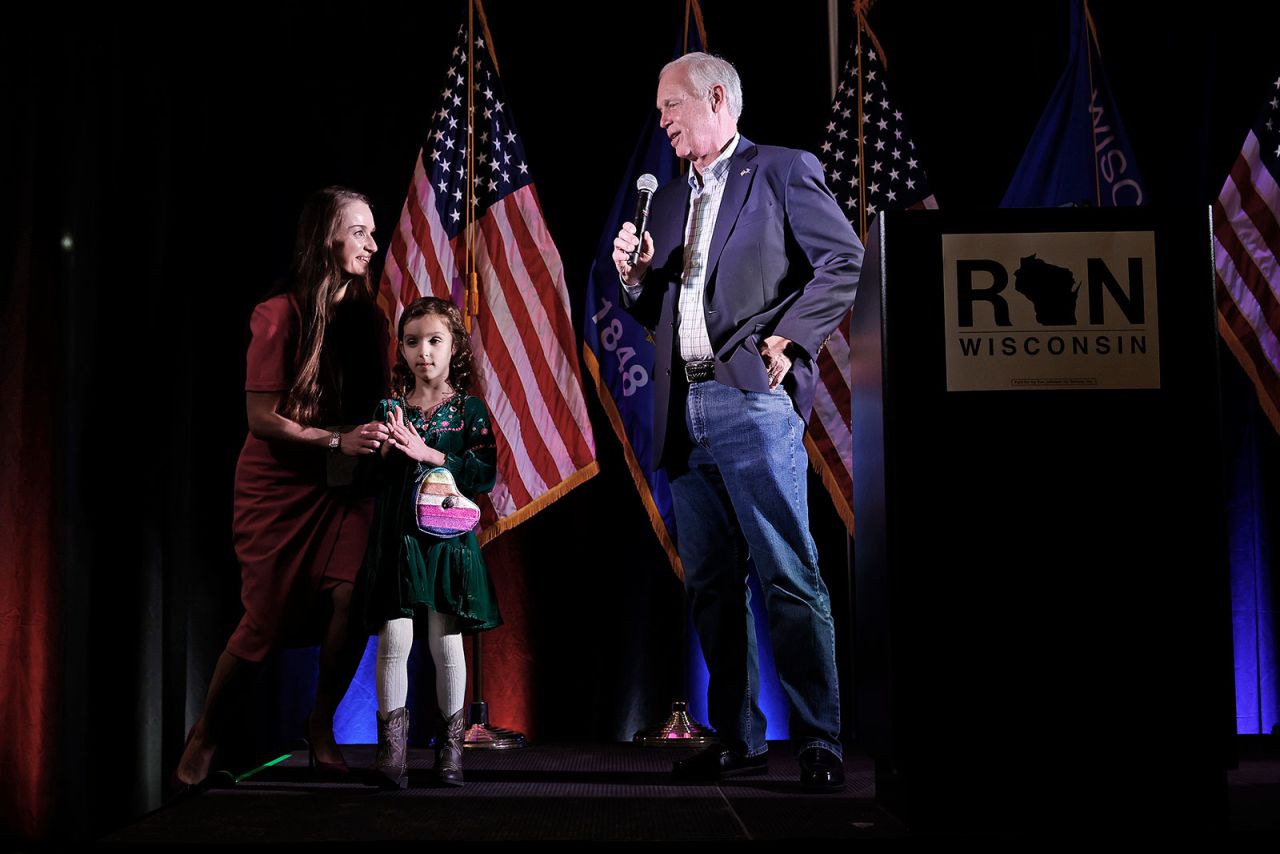 Sen. Ron Johnson wishes his granddaughter a happy seventh birthday with his daughter during an election night party in Neenah, Wisconsin, on Tuesday. 