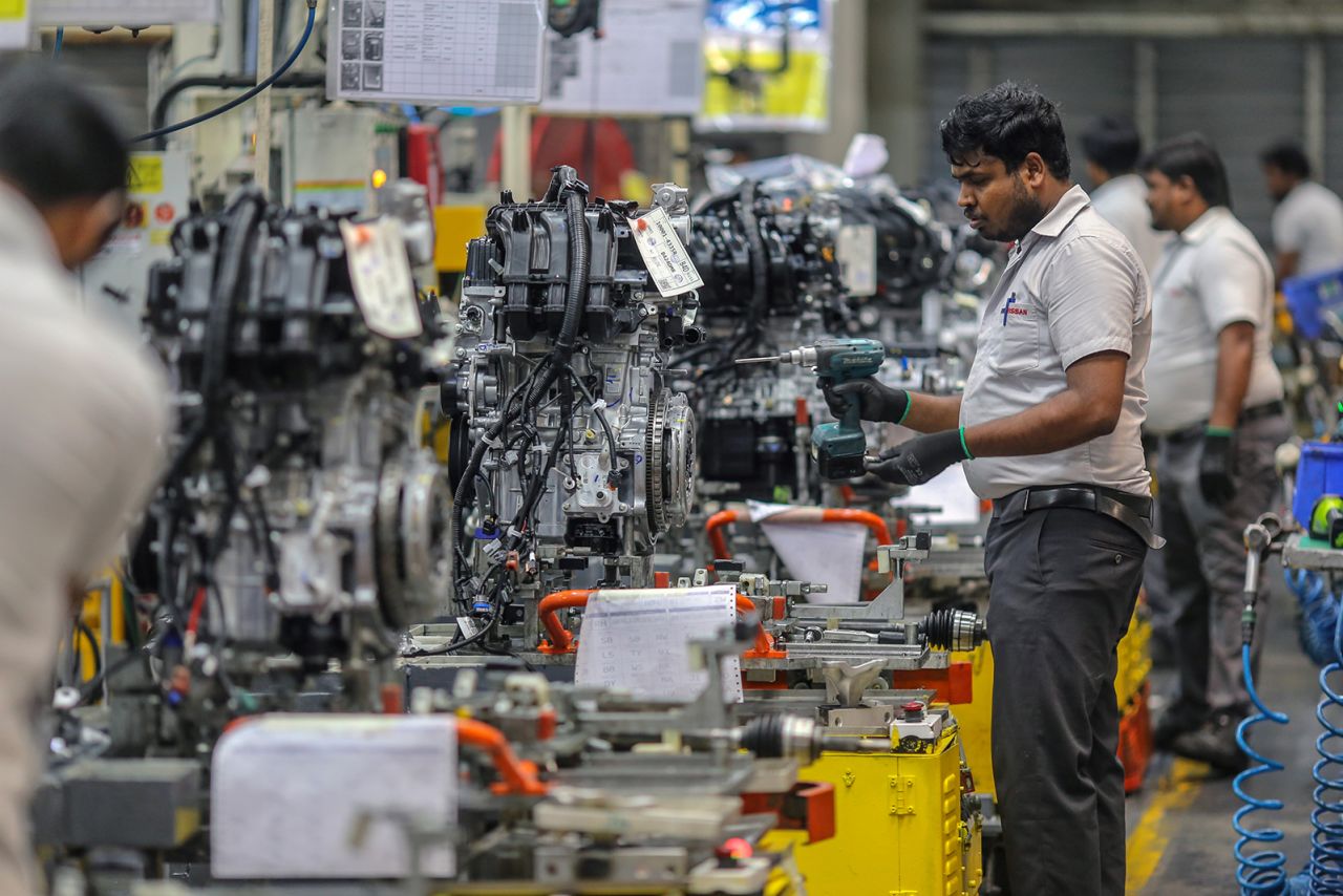 Workers on the production line at the Renault Nissan Automotive India Pvt. manufacturing plant in Chennai, India, on Wednesday, March 27.