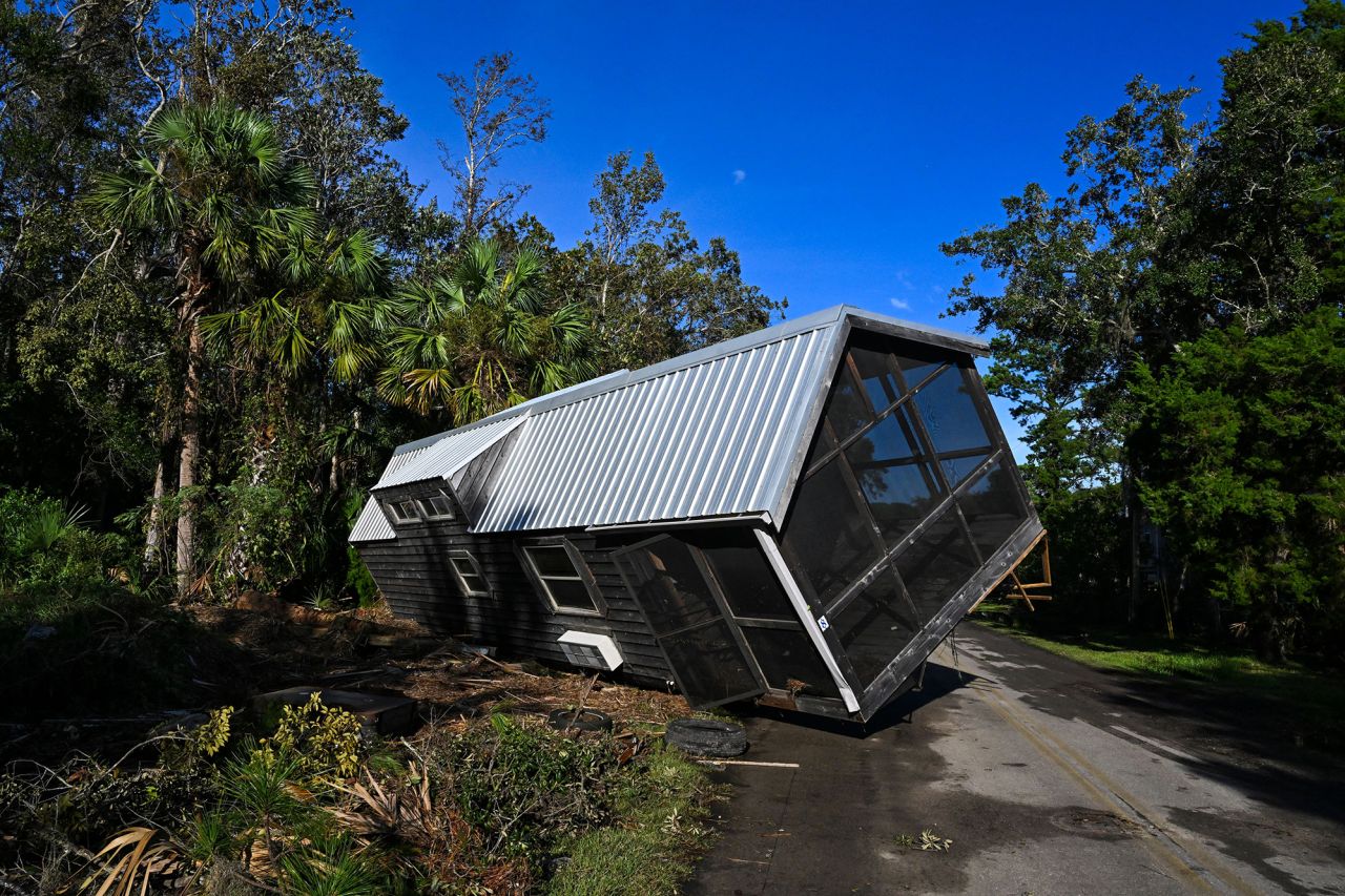 A displaced mobile home is seen in the middle of a road in Steinhatchee, Florida, on August 30. 