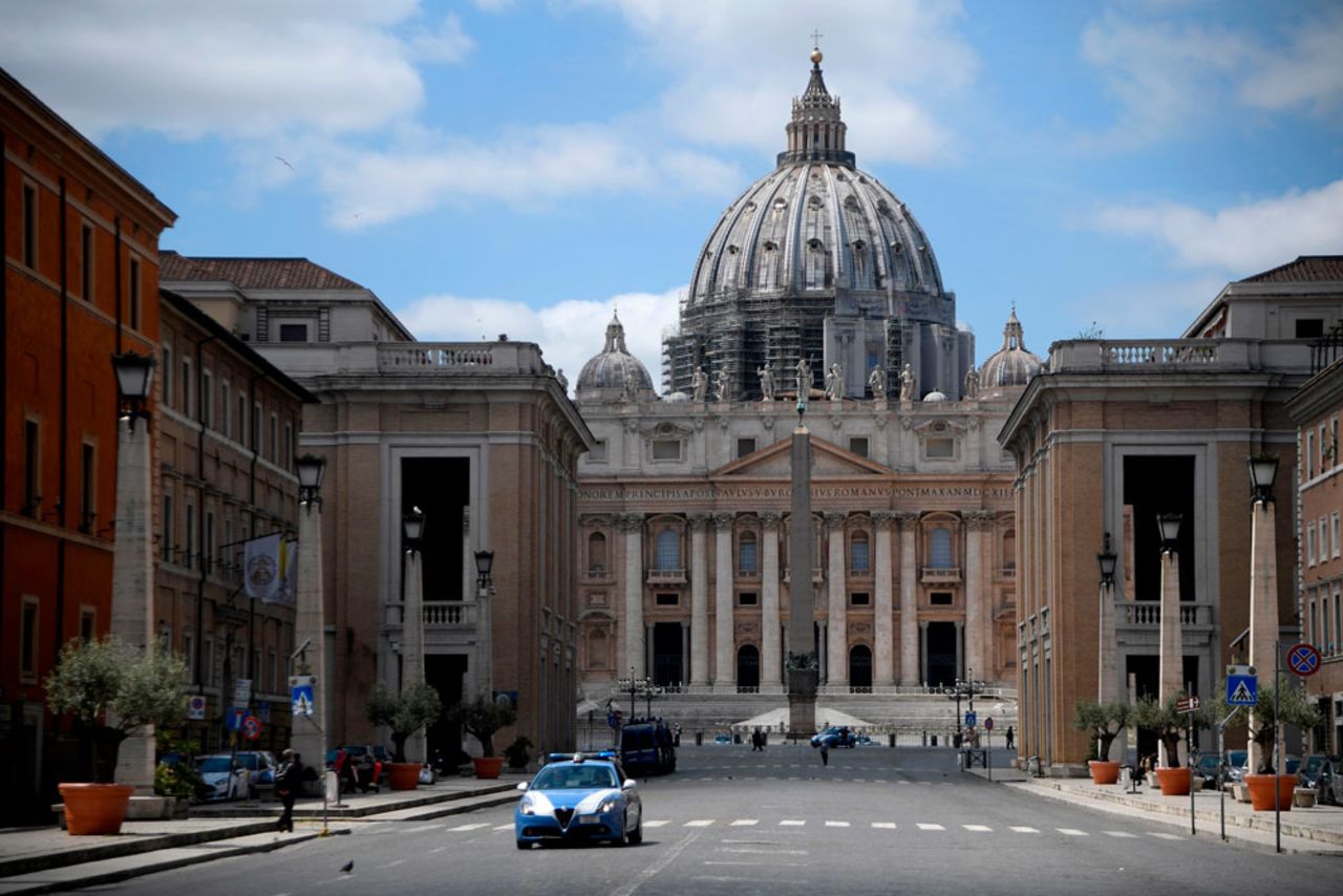 An Italian State Police car patrols along Via della Conciliazione on May 6 in Rome near Vatican City.