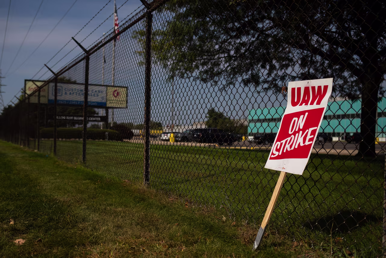 A "UAW On Strike" sign near a picket line outside the General Motors Co. Ypsilanti Processing Center in Ypsilanti, Michigan, on Friday, Sept. 22.