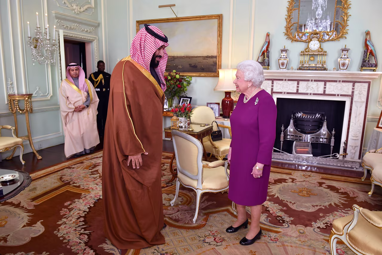 Queen Elizabeth greets Mohammed bin Salman, the Crown Prince of Saudi Arabia, at Buckingham Palace in London on March 7, 2018.